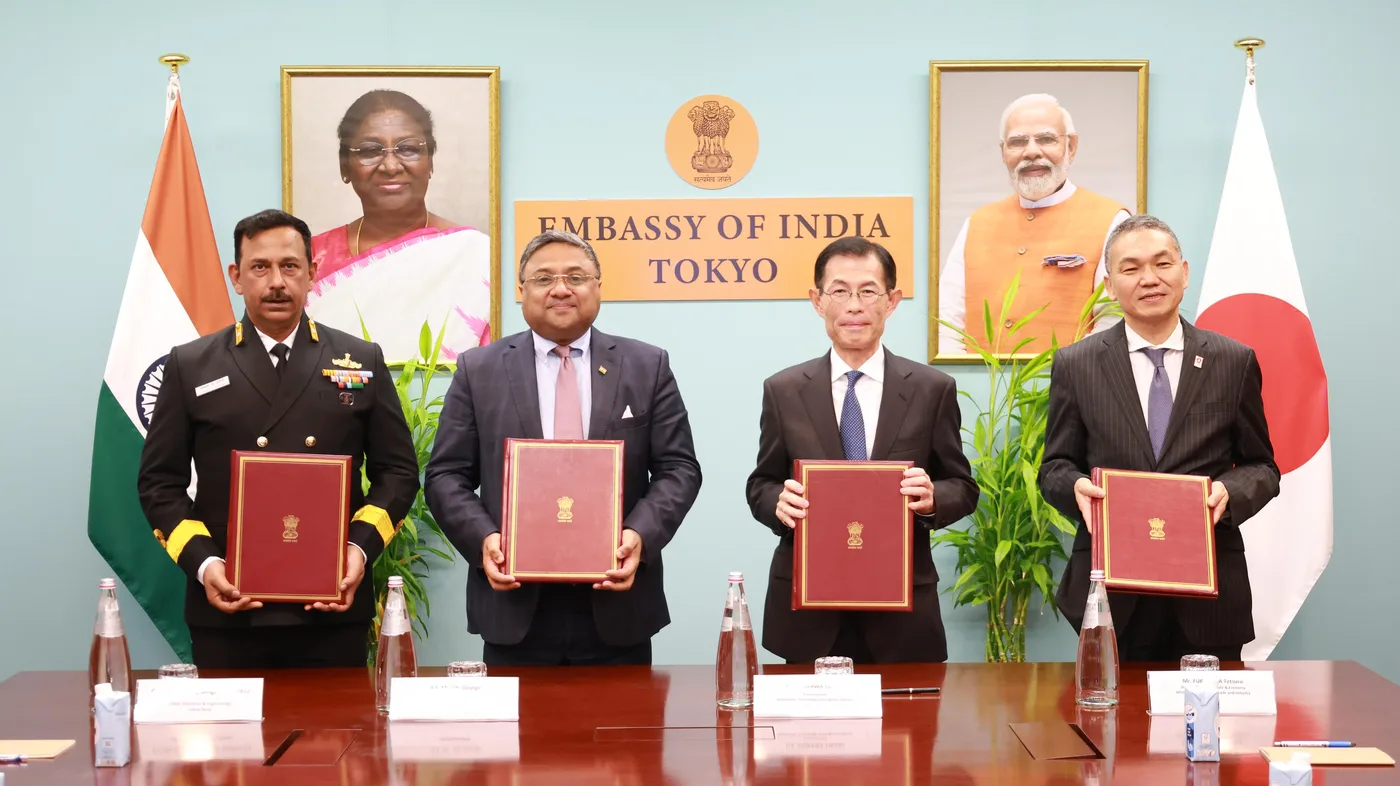 Officials of India and Japan holding the signed Memorandum of Implementation for co-development of UNICORN naval stealth antenna masts at the Embassy of India in Tokyo